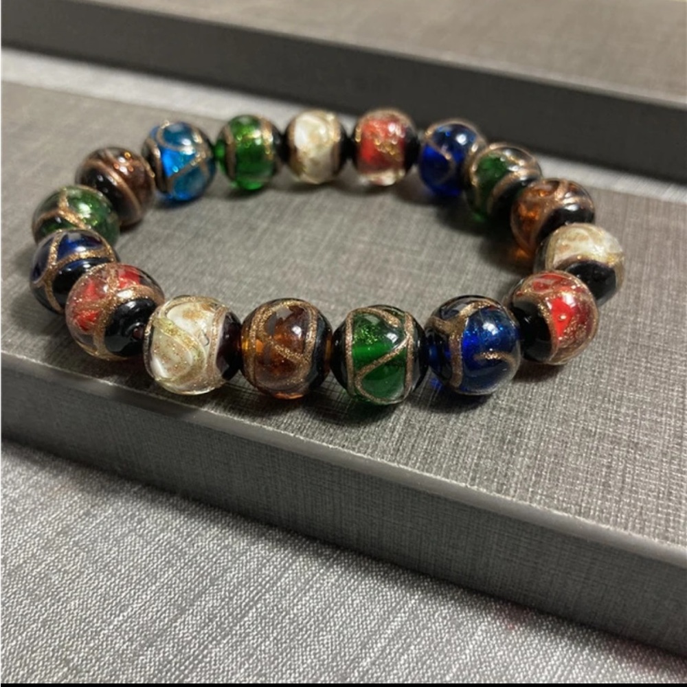 Glass bead bracelet made from ashes from Lama Temple